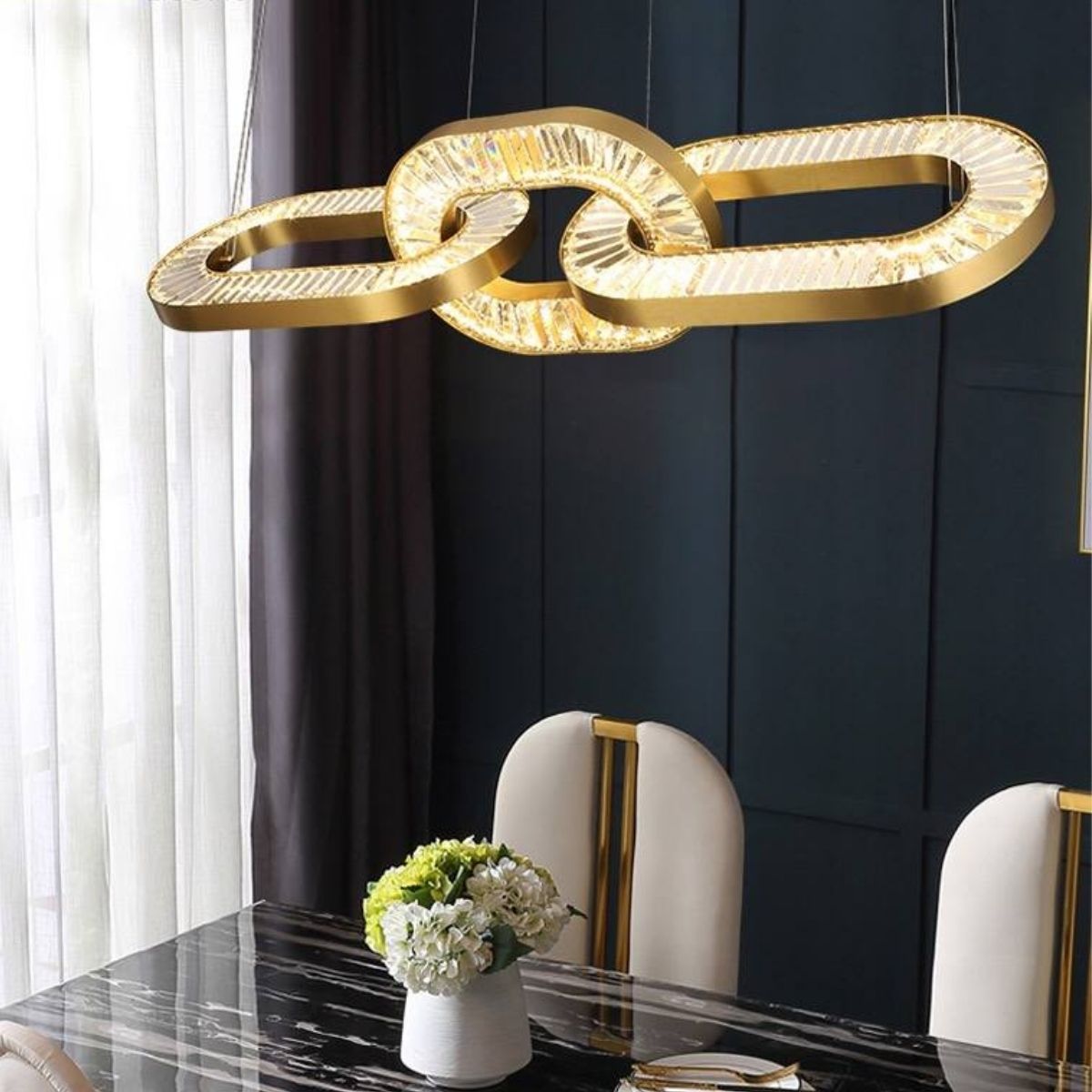 Lustre Chandelier Light in Australia Hanging Above Dining Table – Elegant Modern Interior Lighting