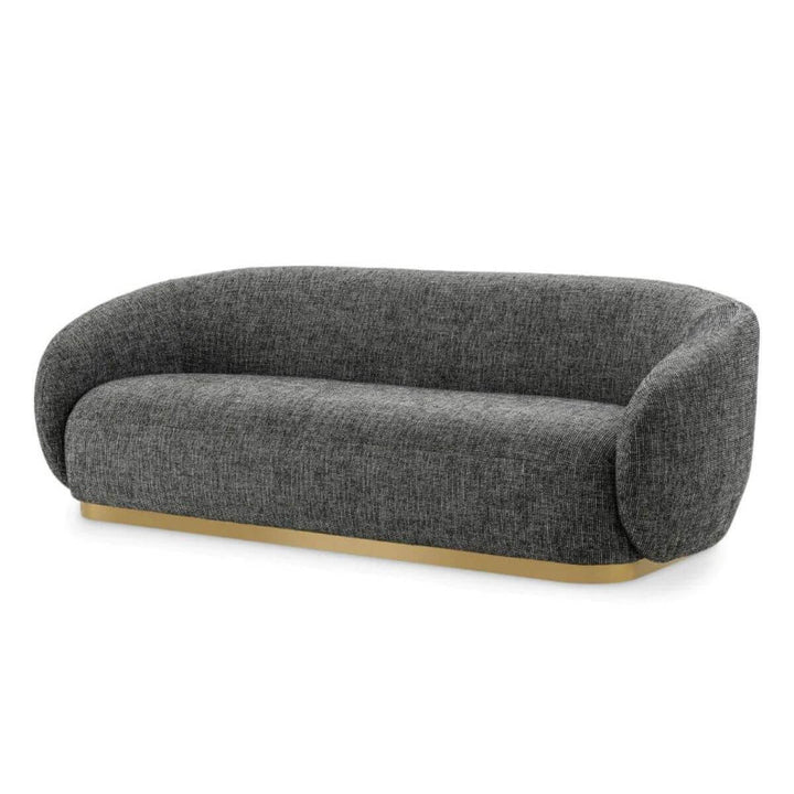 Side angle view of Luxe Living cotton linen three-seater sofa highlighting sleek design and plush cushions