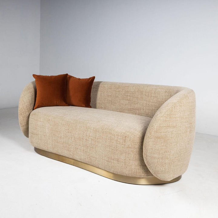 Side view of Luxe Living cotton linen two-seater sofa highlighting soft fabric and sleek silhouette