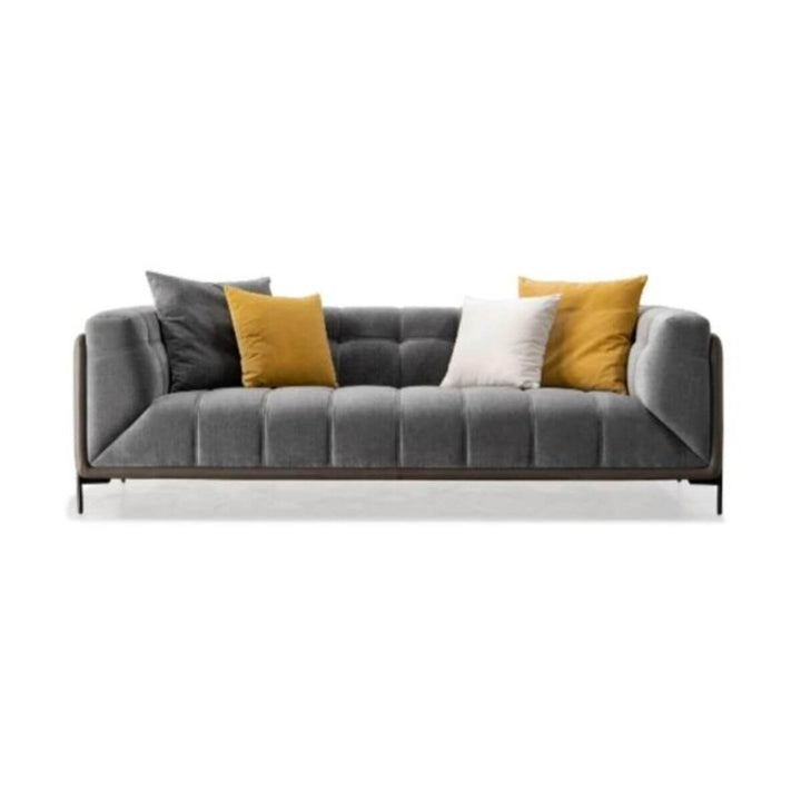 Front view of Luxurious Posh Pavilion velvet three-seater sofa showcasing plush texture and classic design