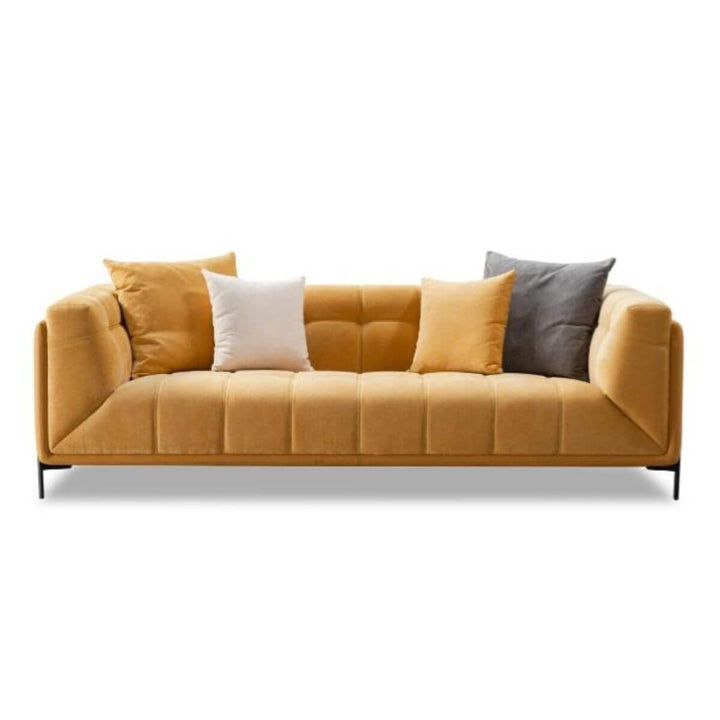 Front view of Luxurious Posh Pavilion velvet three-seater sofa showcasing plush texture and classic design