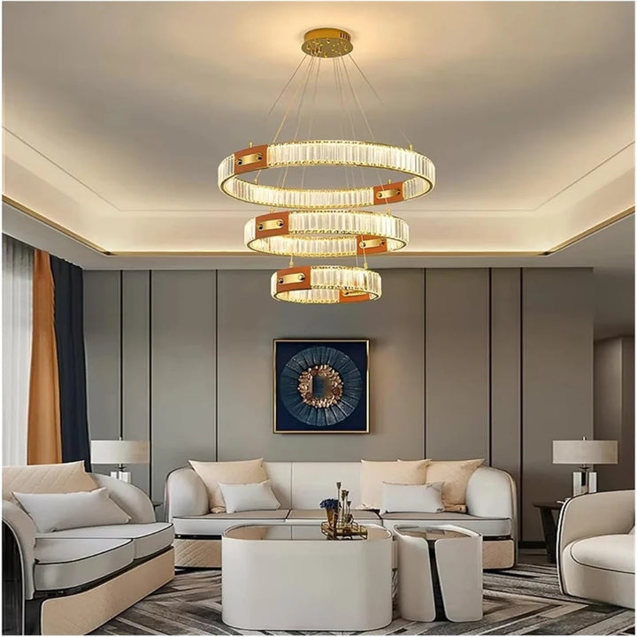 Kian crystal pendant light modern chandelier installed in living room, featuring sleek design and sparkling crystals