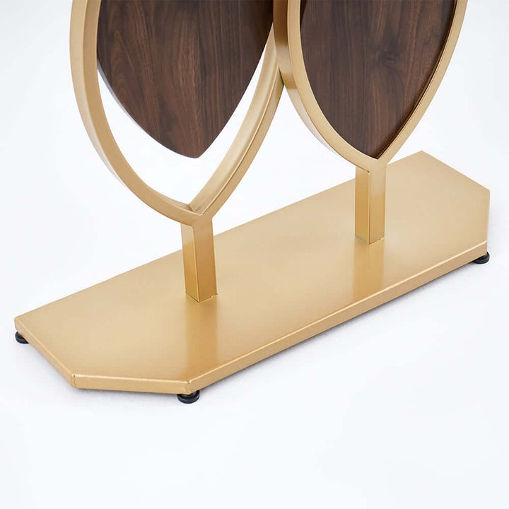 Lower view of luxury leaf design console table highlighting sintered stone top, gold accents