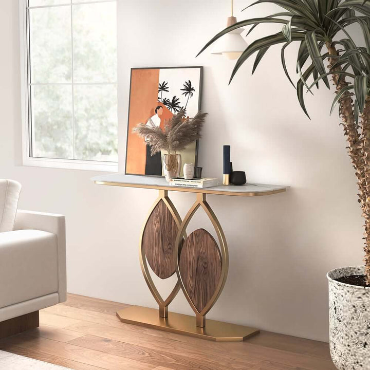 Front side view of luxury leaf design console table with sintered stone top and elegant gold accents