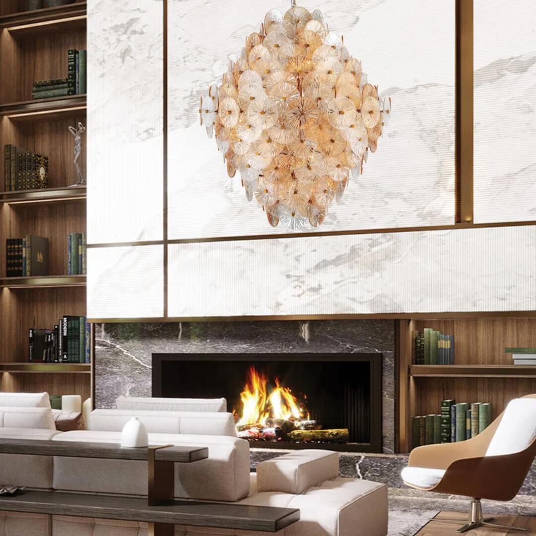 Luz de Sol Renato chandelier hanging in a modern living room – elegant gold fixture illuminating the space