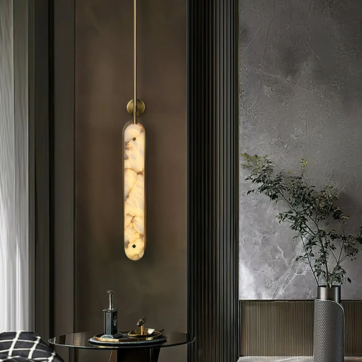 Lysandra modern wall sconce light front view, showcasing elegant minimalist design for stylish home interiors