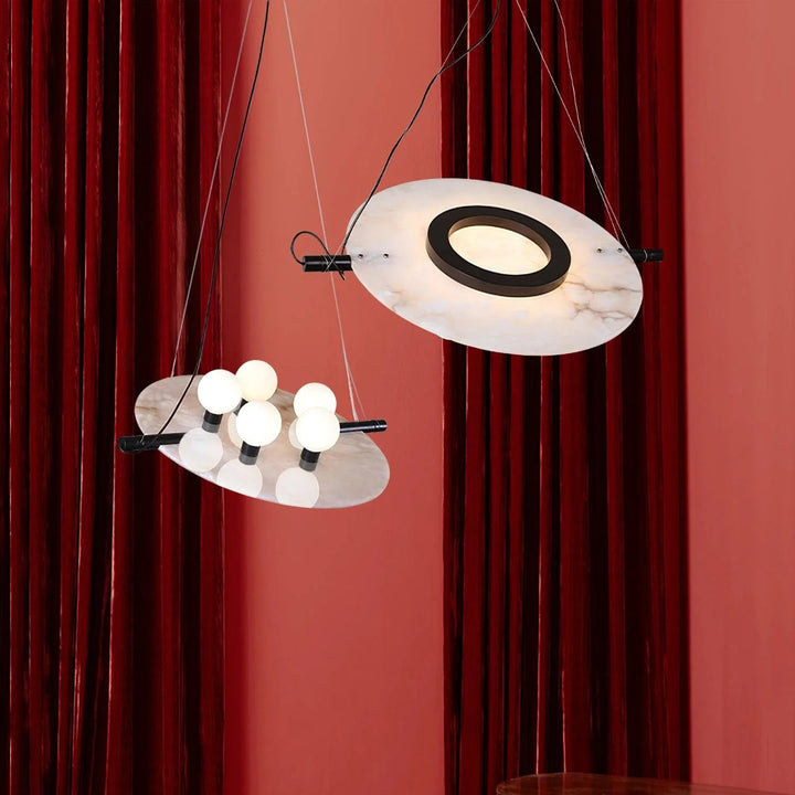 Inside view of Magma pendant lamp with glowing gold fiber interior and black fiberglass exterior