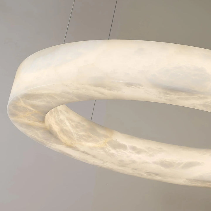 Marika luxury alabaster chandelier close-up view of marble ring highlighting elegant crystals and refined design