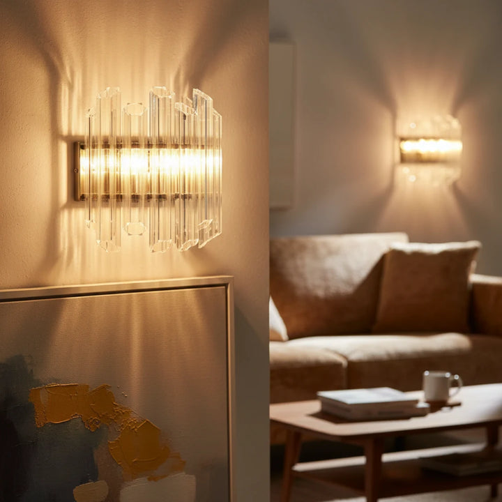 Close-up view of Massimo Picco modern glass wall light in a stylish living room setting