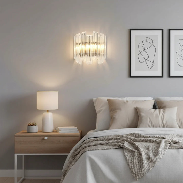 Massimo Picco modern glass wall light in a cozy bedroom, providing sleek and soft illumination