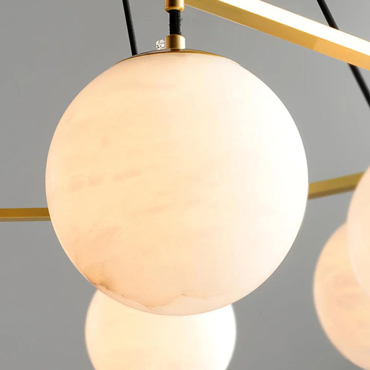 Miira Alabaster Chandelier with marble balls, front view showcasing luxury lighting and elegant design