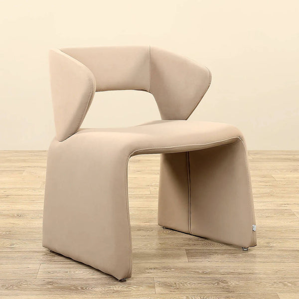 Modern beige dining chair with smooth curved backrest and cushioned seat – elegant and comfortable.