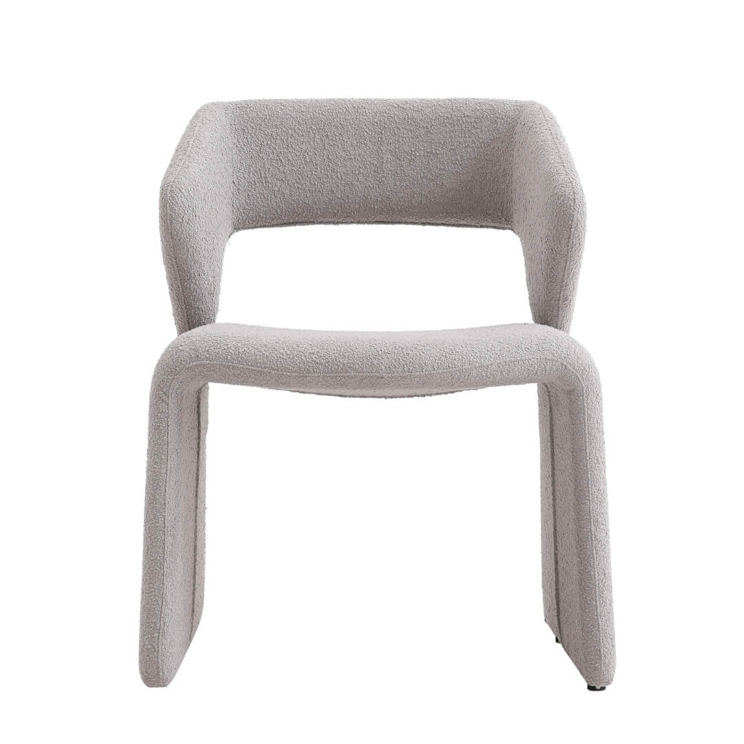 Modern beige dining chair with smooth curved backrest and cushioned seat – elegant and comfortable.