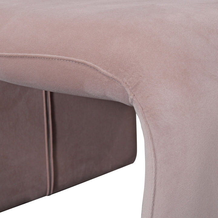 Modern beige curved dining chair with smooth upholstery and sleek frame – comfortable and stylish.