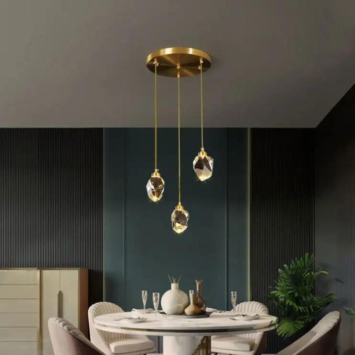 Modern Harmony adjustable pendant light above dining table, creating warm, stylish ambiance
