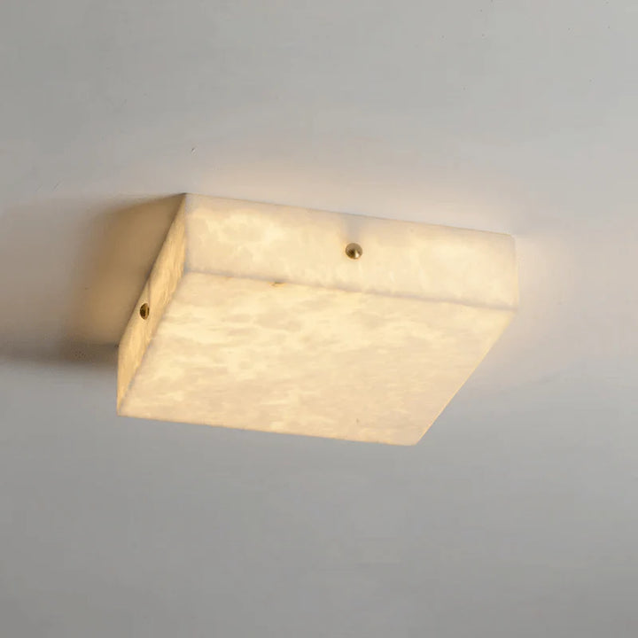 Stylish below view of modern alabaster ceiling light for living room or bedroom