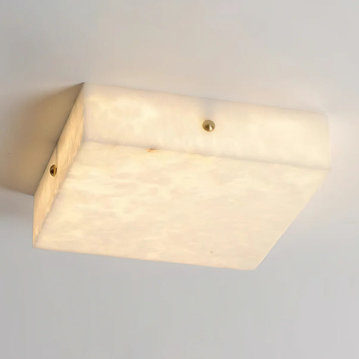 Modern square alabaster ceiling light viewed from below for stylish interior décor