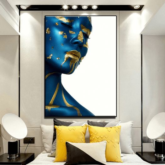 Detailed view of modern woman canvas portrait featuring blue and gold colors