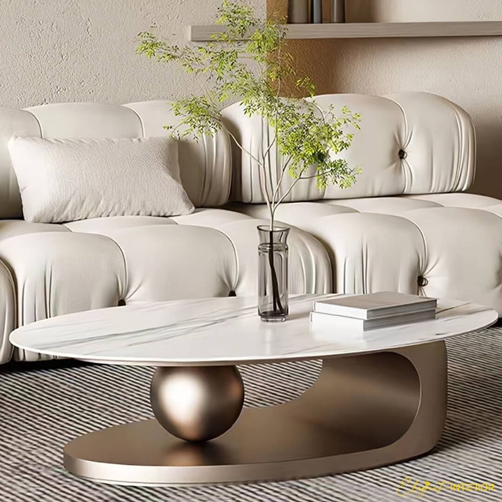 Monument modern coffee table with stainless steel ball base in stylish living room setting