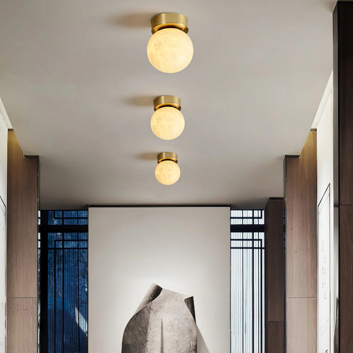 Moon alabaster ceiling light in living room for modern and elegant home décor lighting