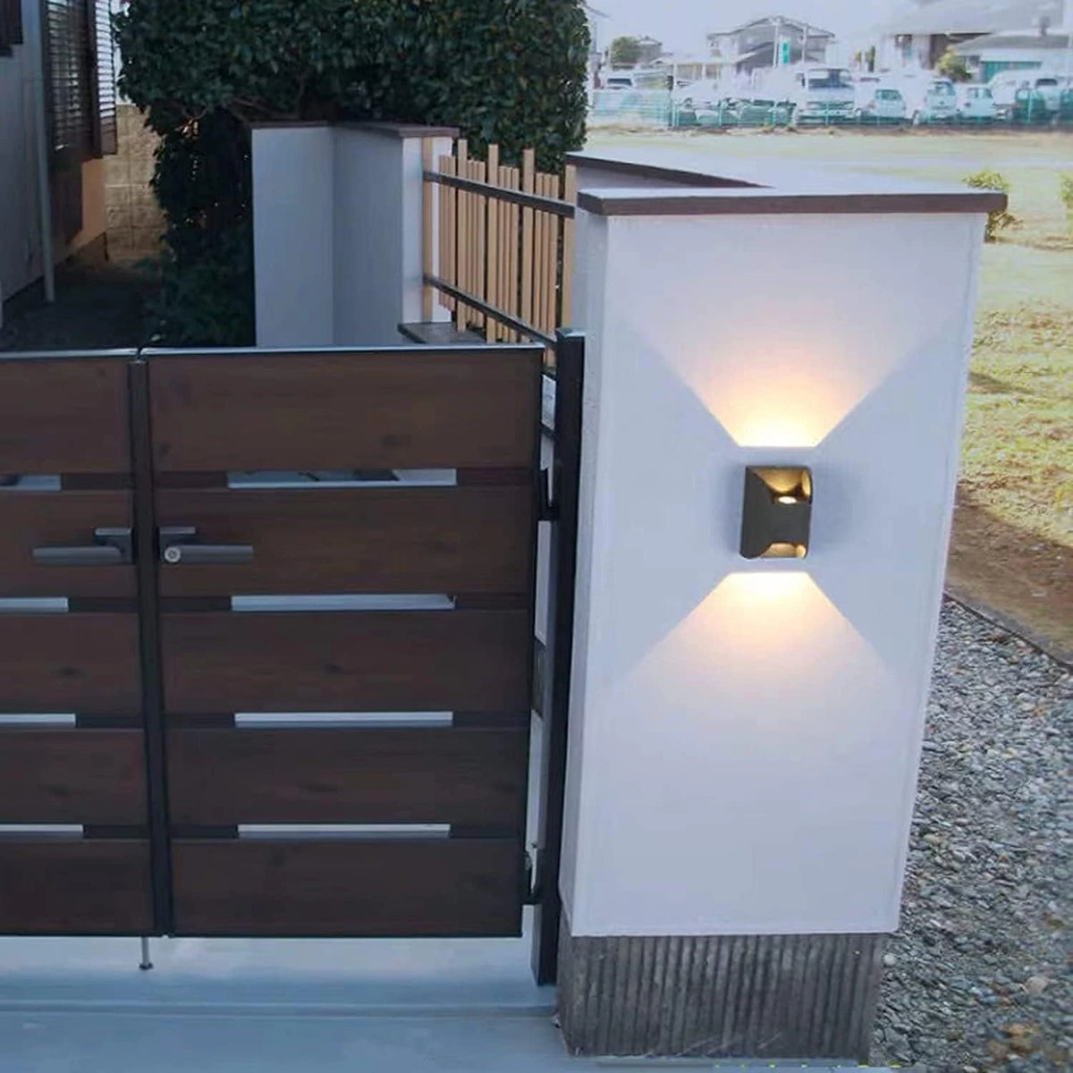 Moonlit Arc LED Wall Light placed in front of house gate – Perfect exterior lighting for security and style.