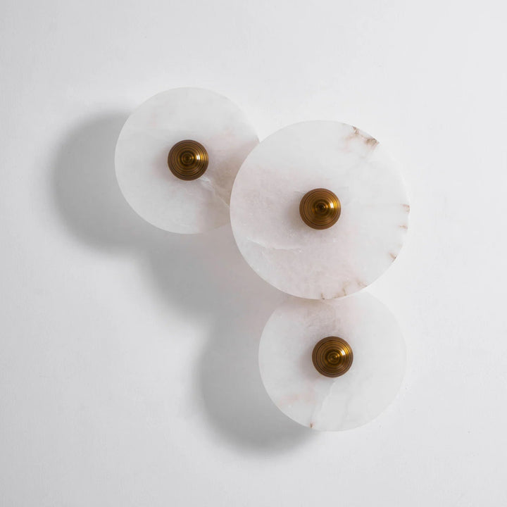 Nayra round alabaster wall lamp, modern lighting, front view for home décor