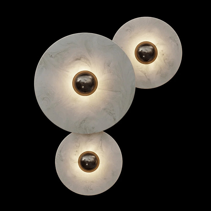 Nayra round alabaster wall lamp, modern lighting, front view, three sizes