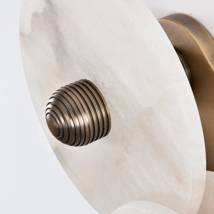 Nayra round alabaster wall lamp, modern lighting, side view for home décor