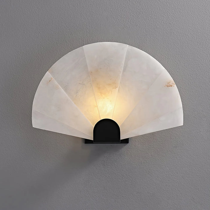 Nevora alabaster wall lamp front view with gold metal accents, modern and elegant lighting fixture