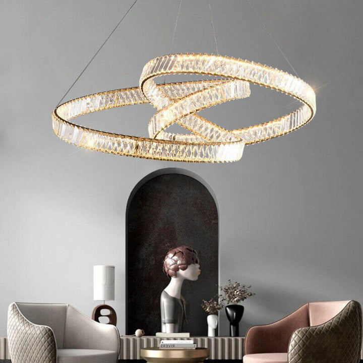 Nova Crystal LED Twisted Chandelier Light turned on in living room, adding warm ambiance and modern elegance