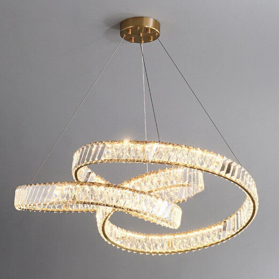 Nova Crystal LED Twisted Chandelier Light turned on in warm mode, emitting a cozy glow with elegant postmodern charm