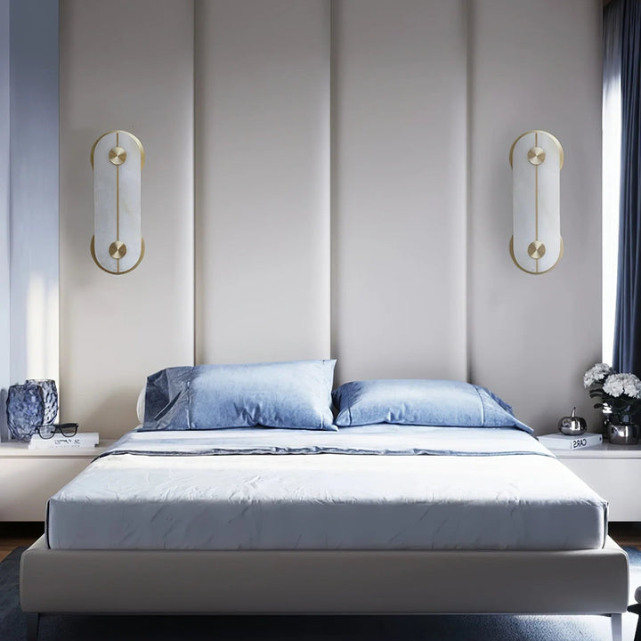 Obvara alabaster wall light bedside front view with gold metal accents, modern elegant lighting