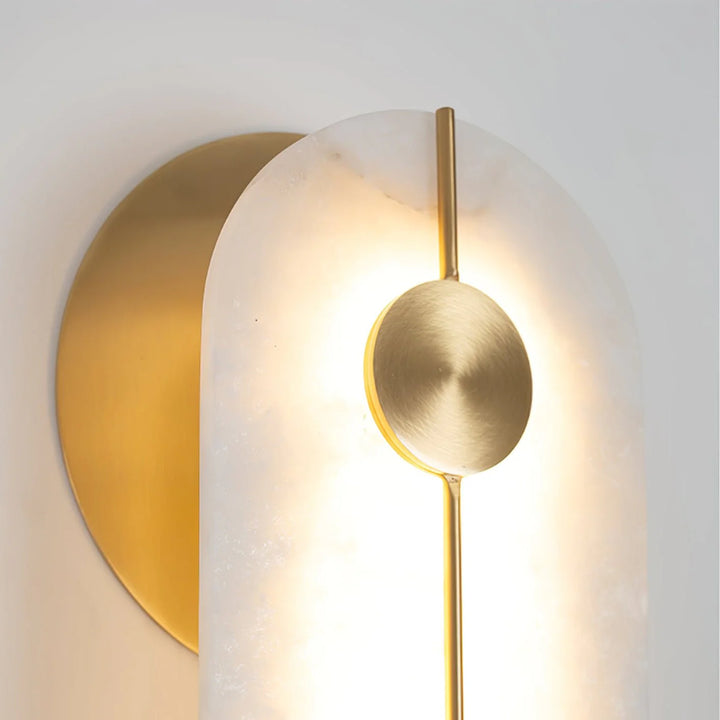 Obvara alabaster wall light wall-mounted front view with gold metal accents, modern elegant design