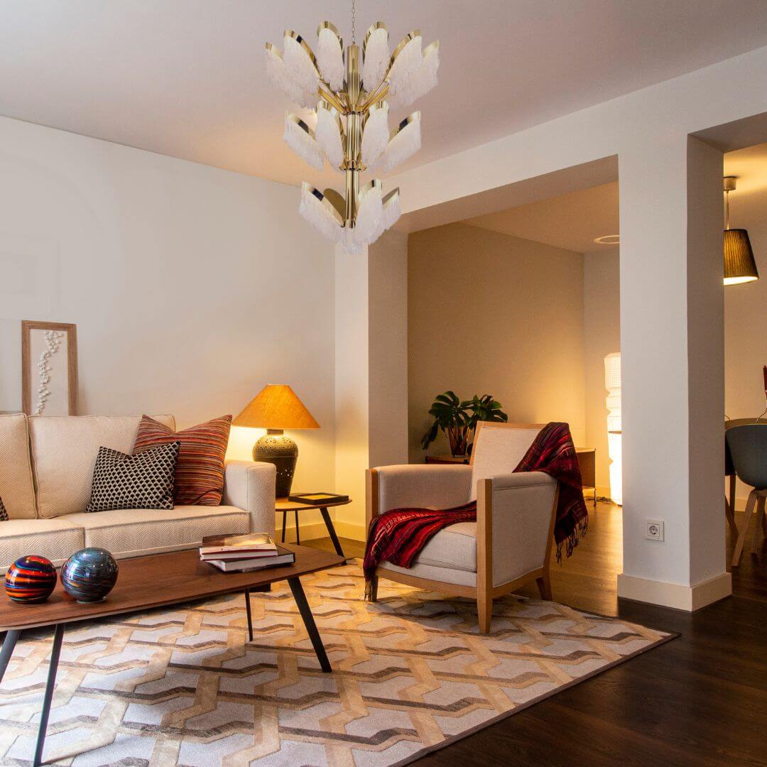 Opalescent LED crystal chandelier light in living room, creating a soft, glowing ambiance with elegant modern design
