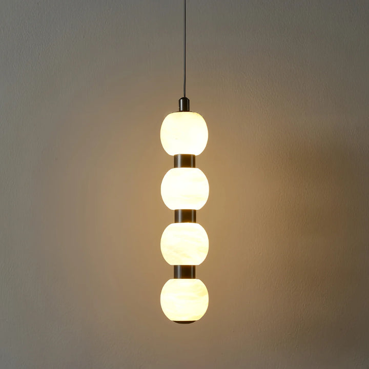 Orbique alabaster pendant lamp modern lighting with four-ball light design shown in front view