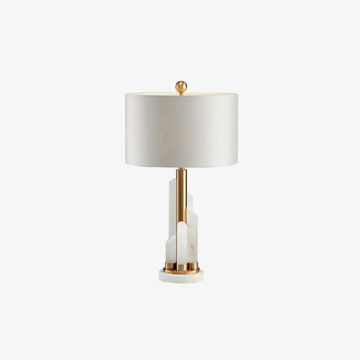 Front bedside view of Orbit metal table lamp with marble base and warm indirect LED lighting