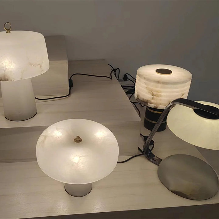 Outela table lamp with modern design, featuring sleek finish and warm ambient lighting for stylish interiors