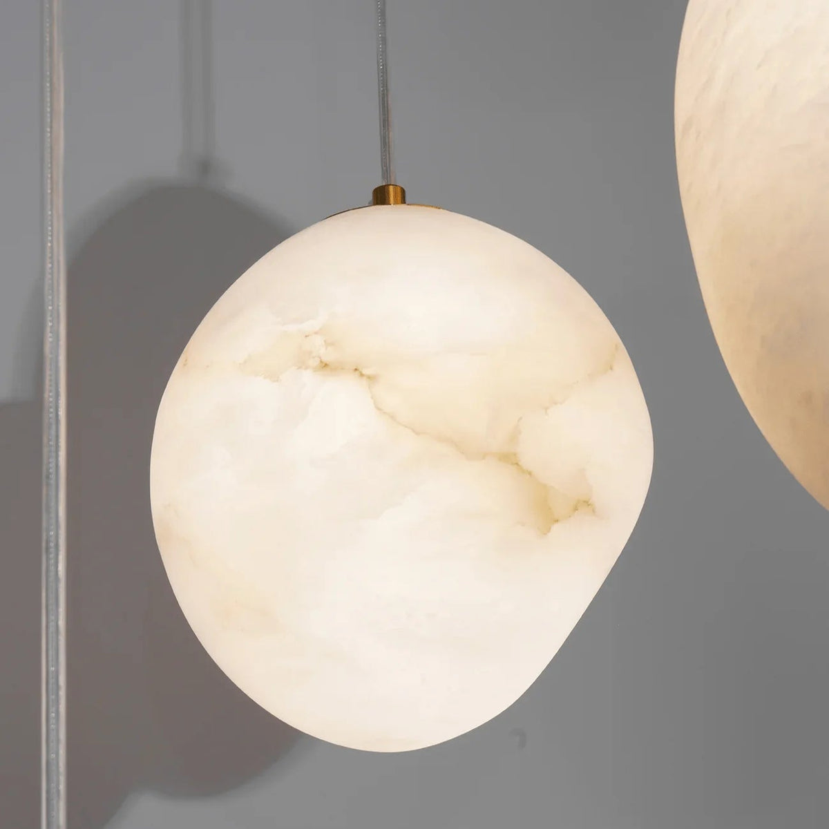 Pebbles Alabaster Pendant Lamp Hanging Front View Modern Elegant Indoor Lighting