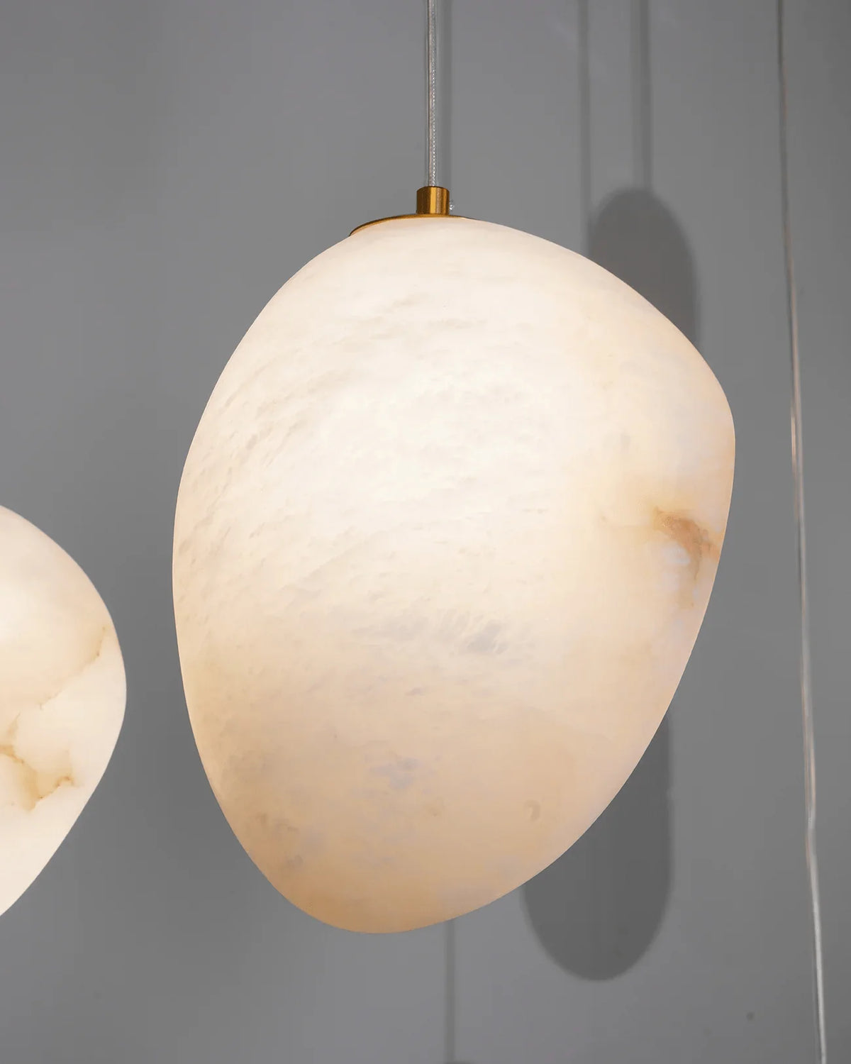 Pebbles Alabaster Pendant Lamp Hanging Front View Modern Elegant Indoor Lighting