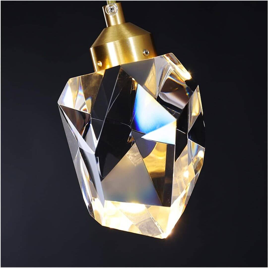 Close-up of pendant chandelier metal frame and crystal details, highlighting modern craftsmanship and elegance