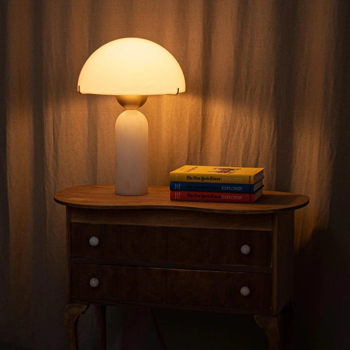 Peono alabaster table lamp switched on – elegant marble lighting for modern interiors