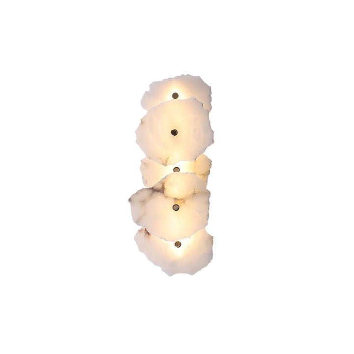 Petra alabaster wall lamp lit, front view, modern lighting decor for elegant home interiors