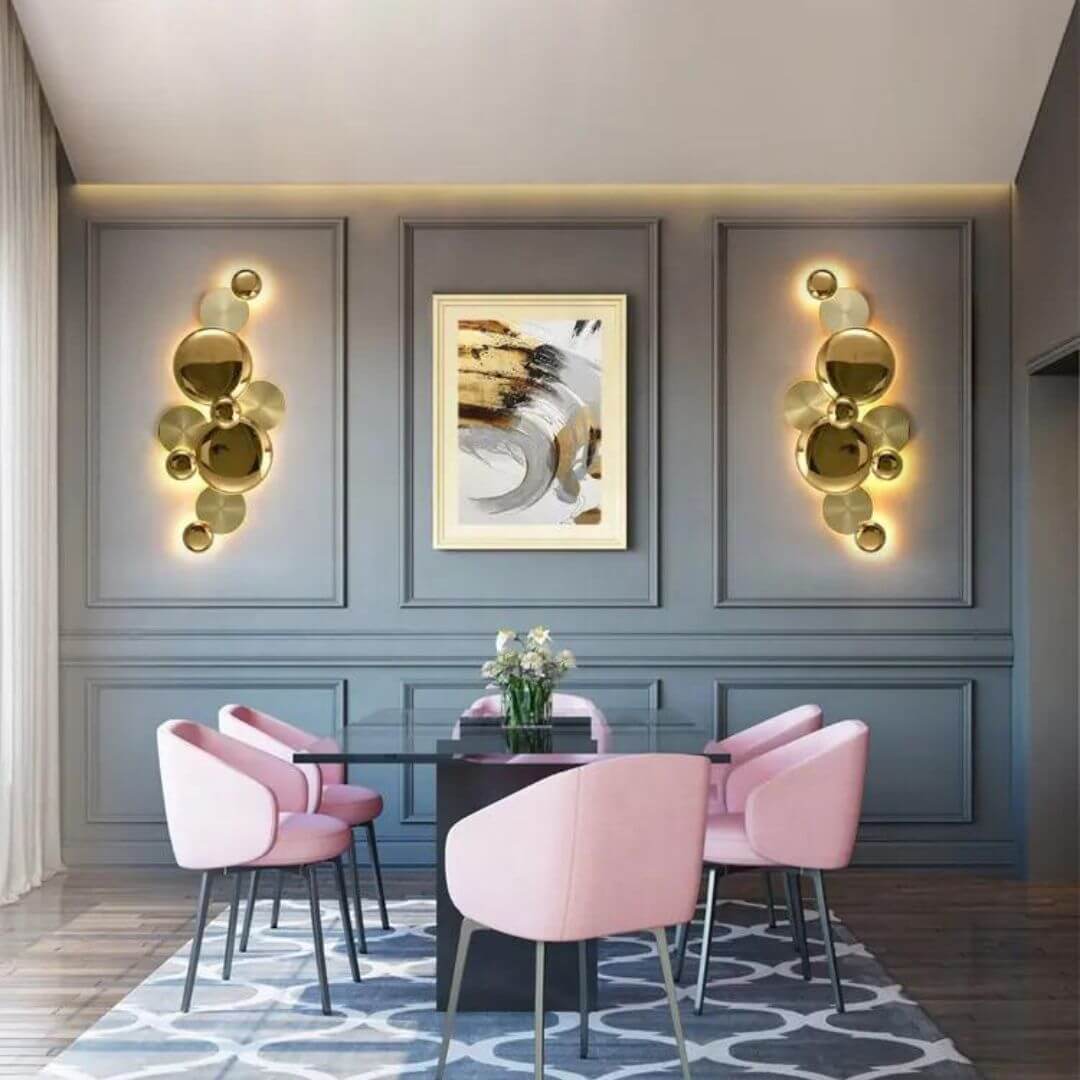 Phosphorescent LED metal wall light turned on, creating warm ambient lighting above the dining area