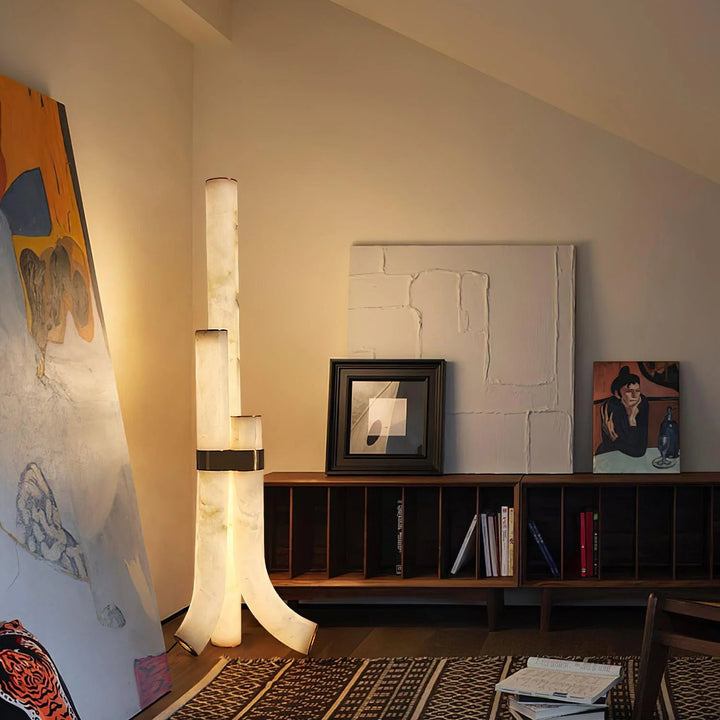 Elegant piped alabaster floor lamp with modern brass design, perfect for luxury home interior lighting