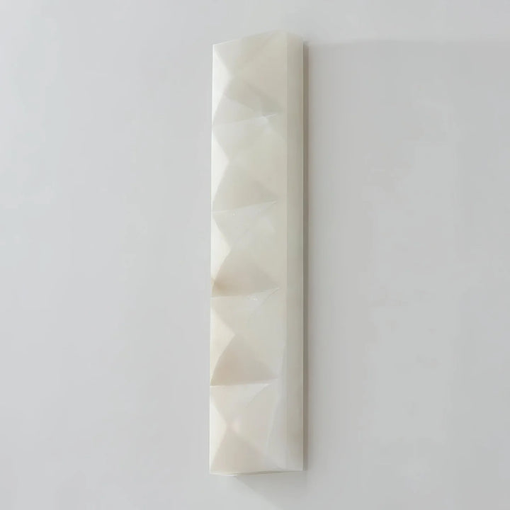 Prism alabaster wall sconce front angle view, elegant modern wall lighting for interiors