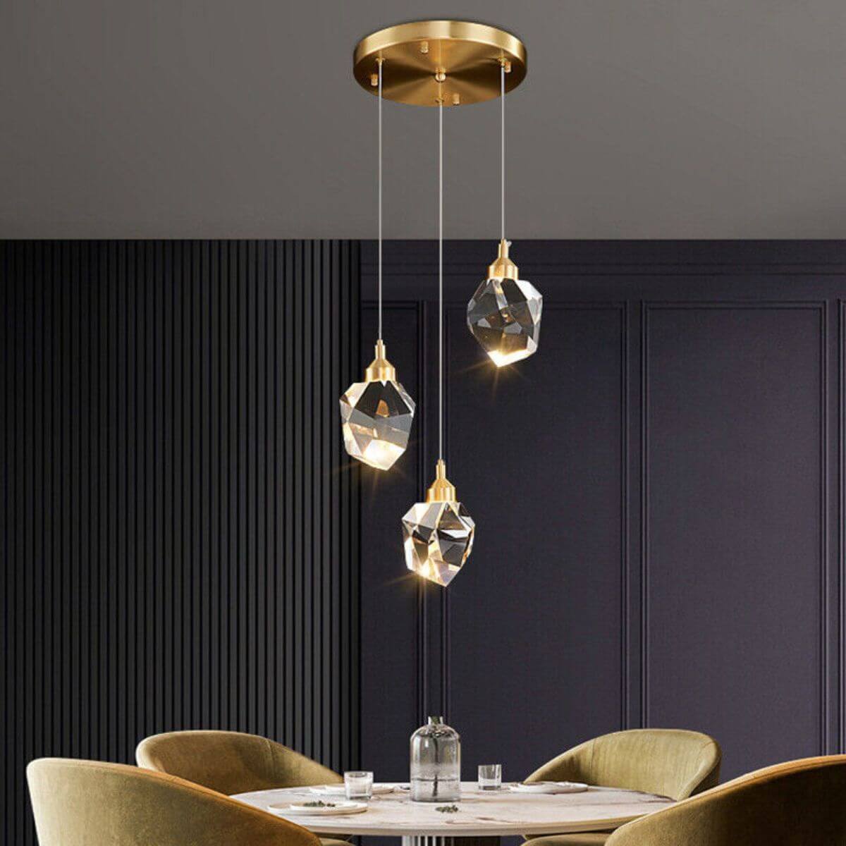 Pulsate 3-head LED crystal chandelier hanging in dining room, adding modern elegance and radiant lighting