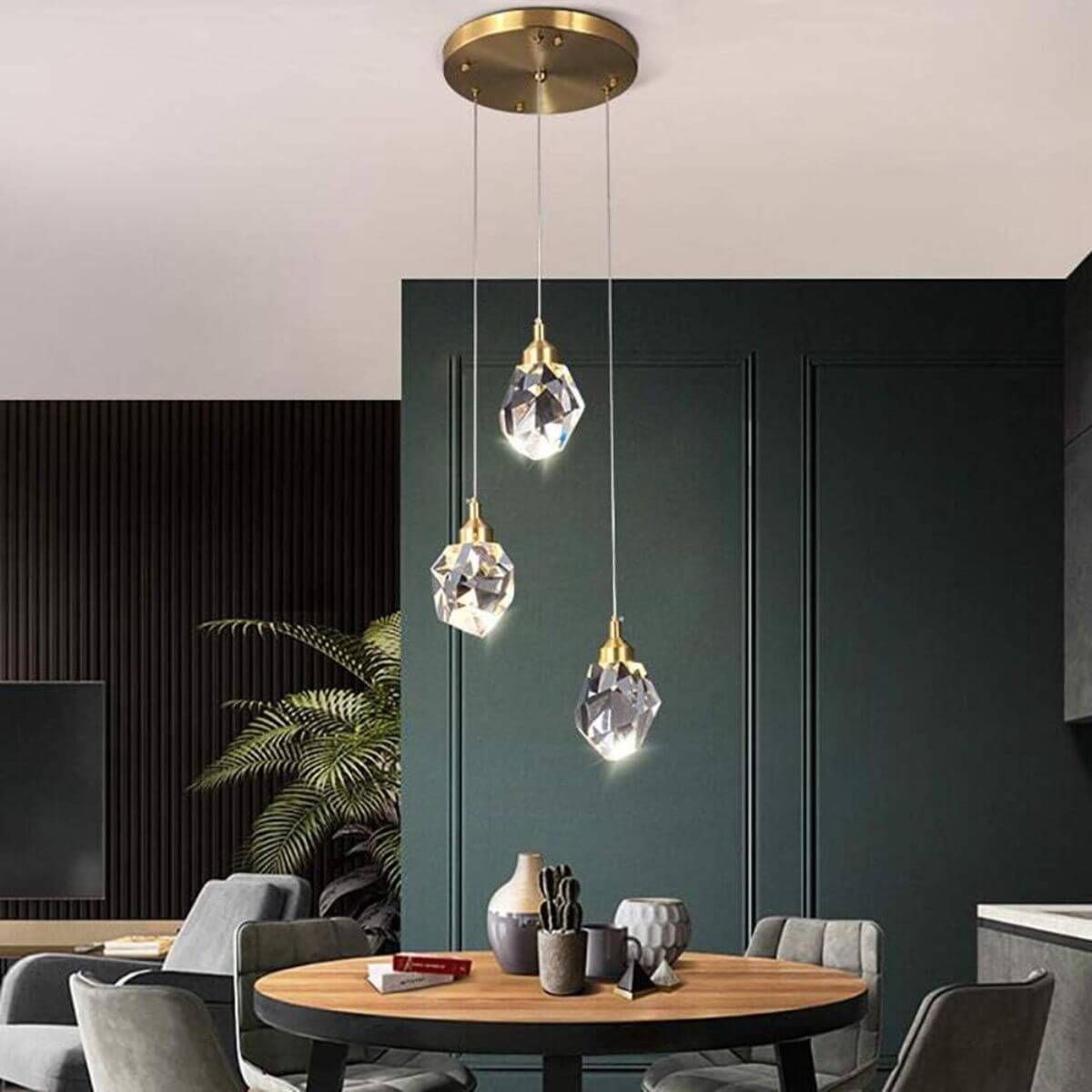 Pulsate 3-head LED crystal chandelier light in Australian living room, adding modern luxury and brilliance