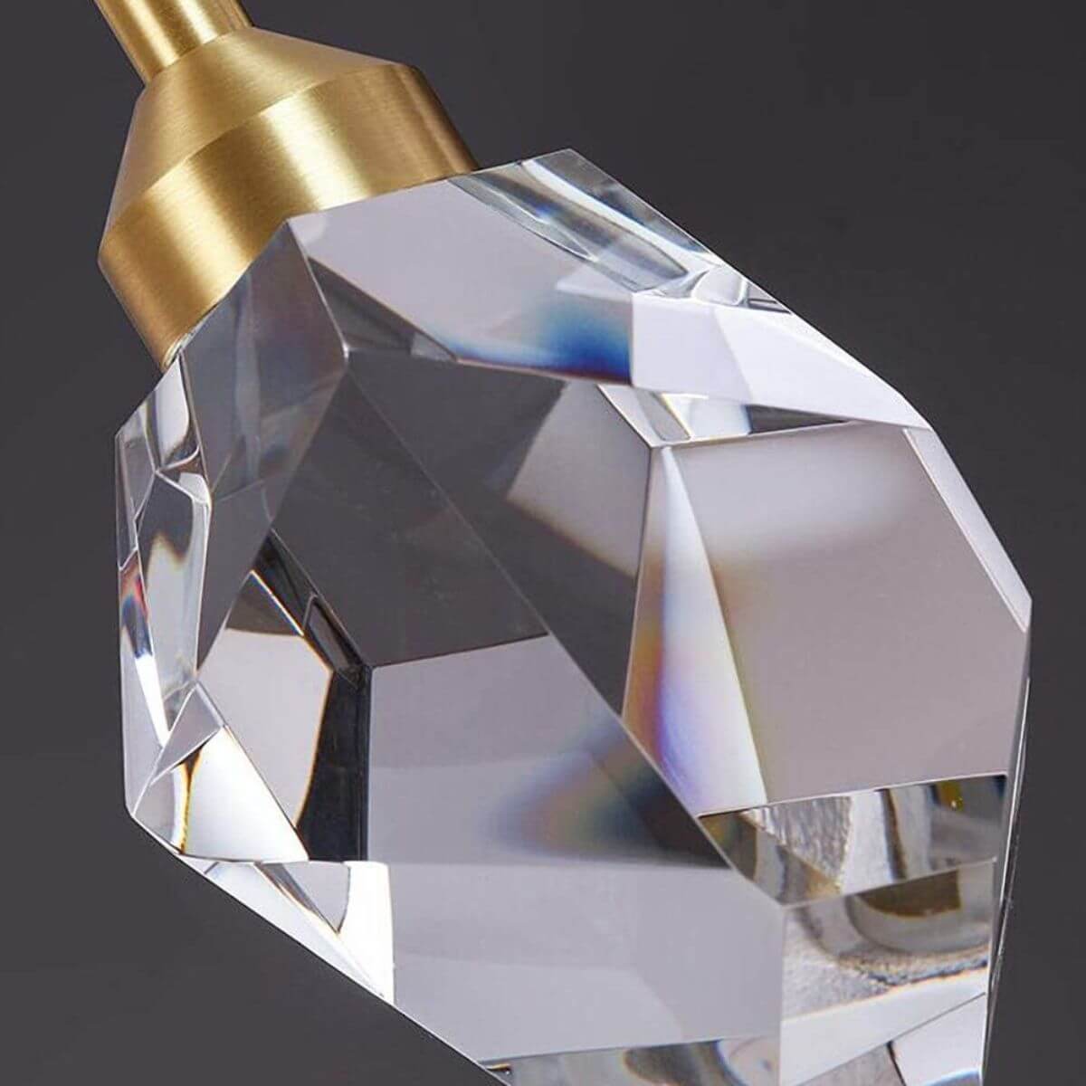 Detail view of Pulsate 3-head LED crystal chandelier light showcasing intricate crystal design and modern finish