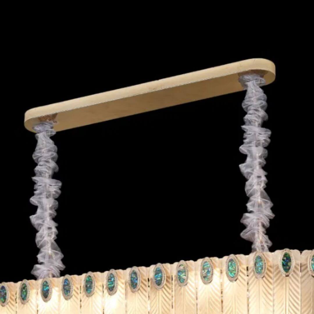 Radiance Chandelier Light Turned On – Side View of Elegant Modern Ceiling Lighting Fixture