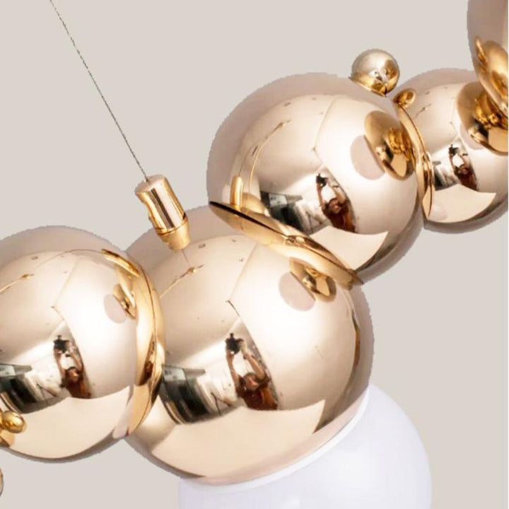 Detailed view of Radiance kitchen island chandelier light, highlighting its modern design, premium materials, and fine craftsmanship